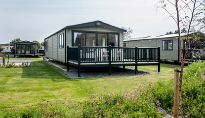 Representation of the outside of a new Platinum with Wrap Around Deck at Harlech View