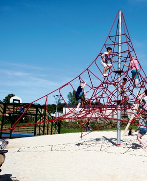 Outdoor play area at Combe Haven